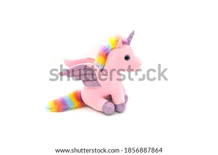 Unicorn plush toy. Isolated on white background  Royalty-Free Stock Photo #1856887864