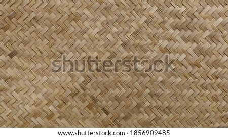 Woven bamboo pattern. Traditional handicraft products woven with bamboo with local ASEAN wisdom. Textured backgrounds for background design. Selective focus