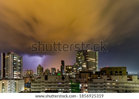 Beautiful picture of storm over the city. Get it.