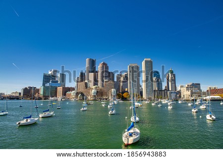 Boston skyline from a moving boat on a beautiful sunny day, Massachusetts.
