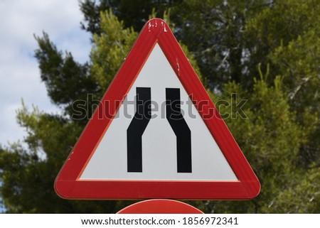 Road sign: "Narrowing", Alicante Province, Costa Blanca, Spain