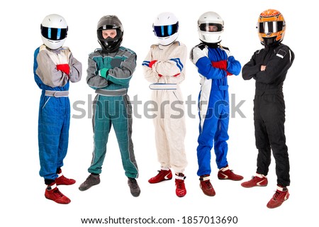 Racing drivers posing with helmets isolated in white Royalty-Free Stock Photo #1857013690