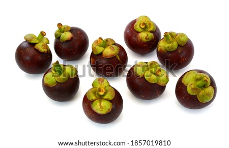 ripe mangosteen fruits isolated on white background