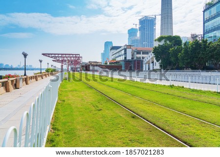 In Guangzhou, Guangdong Province, China, a railway passes between urban buildings