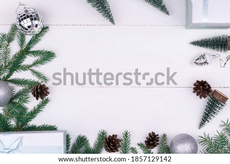 Frame of Christmas decorations on a white background