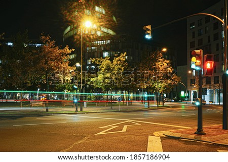 Light painting photos on citytown with cars and traffic lights.