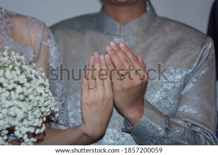 picture of man and woman with engagement ring