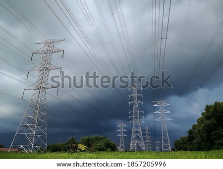 Noise . Grain. Shake. Motion blur. Dark clouds in the area of the electric cable tower