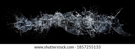 water splash isolated on black background Royalty-Free Stock Photo #1857255133