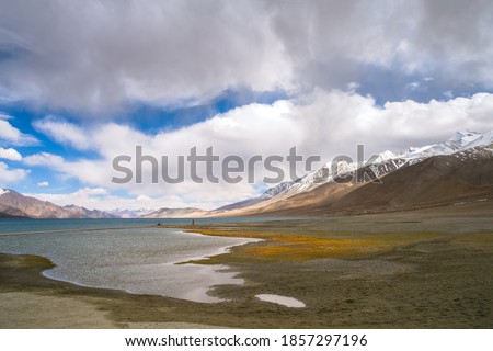 Pangong Tso (High grassland lake), or Pangong Lake, an endorheic lake in the Himalayas that extends from India to the Tibetan Autonomous Region of China, Leh Ladakh, Jammu and Kashmir, India