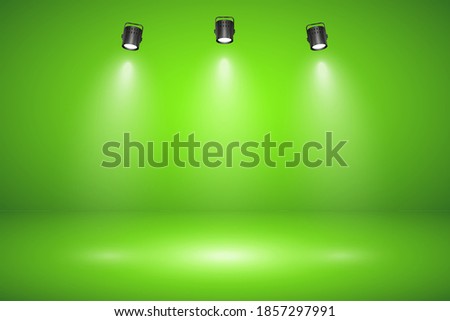 Empty green studio abstract background with spotlight effect. Product showcase backdrop. Chroma key compositing. Royalty-Free Stock Photo #1857297991
