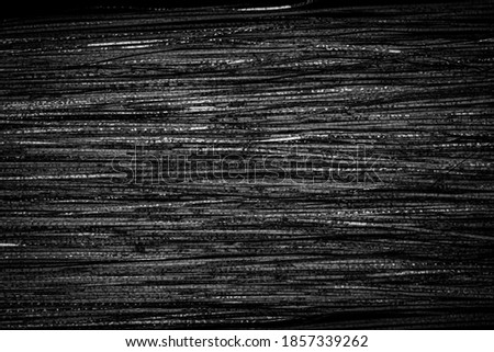Metal black white stripes. Noisy striped black surface background.  Abstract glitch art effect.