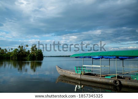 Beautiful photography of Traveling Boat, Blue sky and blue river, Traveling bot with green roof, Beautiful nature photography