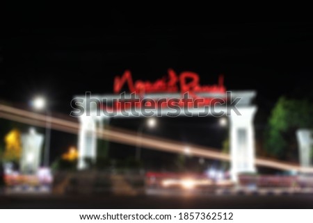 Blurry picture of long exposure light sign in ngawi city