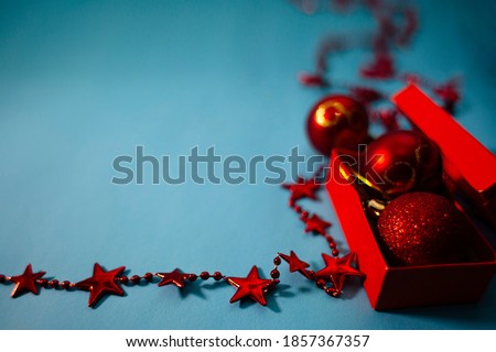 Christmas party celebration - decorative red box with Christmas decorations - blank space