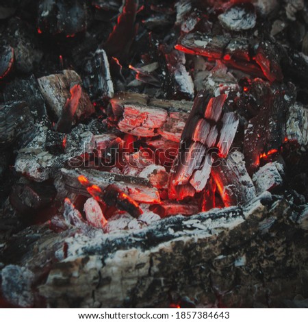 A smoldering red hot charcoal for barbecue top view