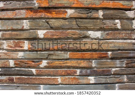 Background – Stone wall with square shaped stones