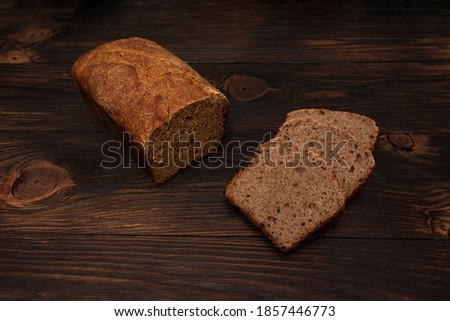Natural unleavened homemade bread on a wooden background cut into slices