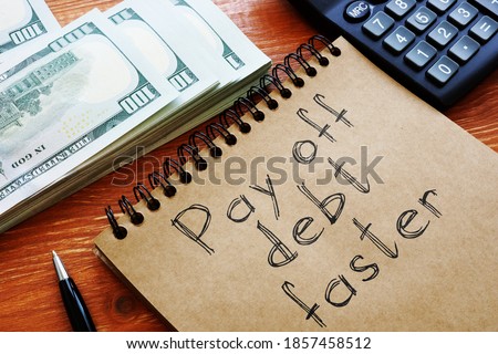 Pay off debt faster is shown on the business photo using the text