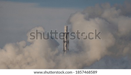 Industrial chimney generating smoke and pollution