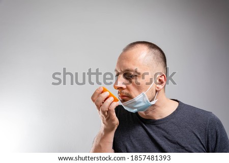 Anosmia or smell blindness, loss of the ability to smell, one of the possible symptoms of covid-19, infectious disease caused by corona virus Royalty-Free Stock Photo #1857481393
