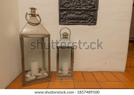 Beautiful view of two candle stick holder as details of interior of private home. 