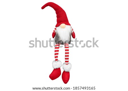 christmas  gnome isolated. Santa Claus on white background.  Christmas gnome is sitting. Symbol new year. Soft. Textile. Copy space. hand made. Christmas toy Royalty-Free Stock Photo #1857493165