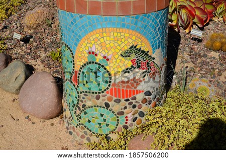 mosaic tiled garden planter in the sun