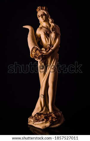 Fortuna roman goddess of wealth, money and fortune Royalty-Free Stock Photo #1857527011