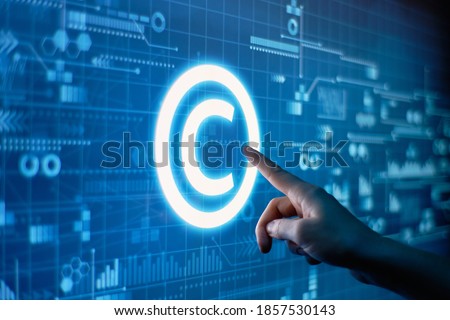 Concept of copyright and intellectual property on a digital display. Royalty-Free Stock Photo #1857530143