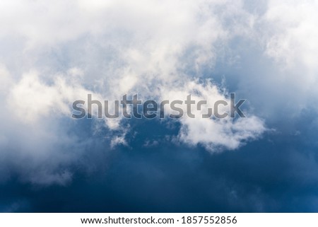 Dramatic thunderstorm clouds in sky before rain. Natural weather cloudscape background