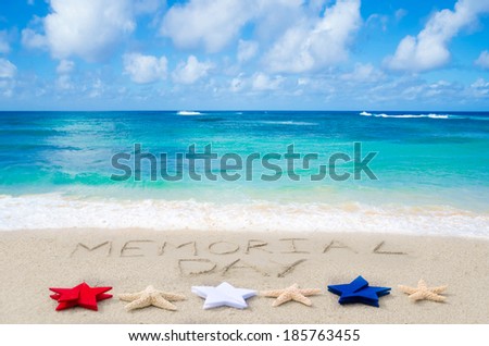 Memorial day background on the sandy beach near ocean
