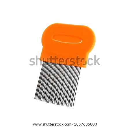 Metal comb for removing lice isolated on white