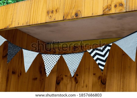 Paper party flags for decoration in cafe.