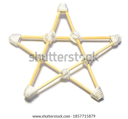Handmade pentagram made of light wooden sticks and white rope isolated on a white background. Manual pentacle for protection and meditation for the witchcraft ritual.