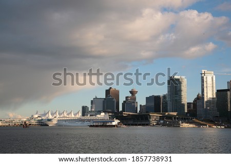 View of Vancouver downtown skyline and coal harbour during springtime seen from Vancouver Stanley Park, British Columbia,  Canada.