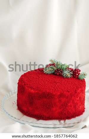 red velvet cake on a table with textile cloth