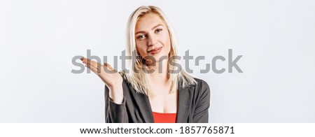 Beautiful happy young girl on gray isolated background