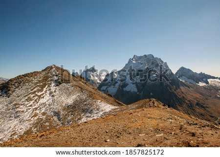 The peaks of the Mussa-Achitara and Dombay-Ulgen mountains. Dombay. Karachay-Cherkessia. Russia