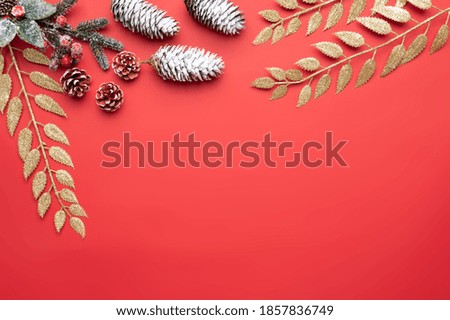 Christmas border. Christmas gifts, fir branches on the background. Flat lay, top view, copy space