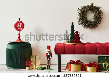 Christmas composition with decoration, christmas tree, gifts, snow and accessories in cozy home decor. Copy space. White and red. Template.