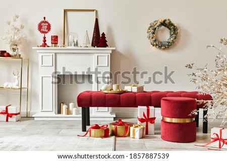 Christmas composition with decoration, christmas tree, gifts, snow and accessories in cozy home decor. Copy space. White and red. Template.