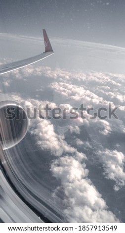 
clouds through an airplane window