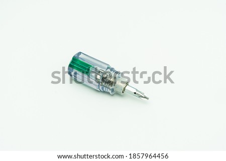 Transparent plastic phillip mini-screwdriver. Isolated on white background