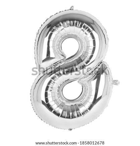 Silver foil balloons with numbers on a white background
