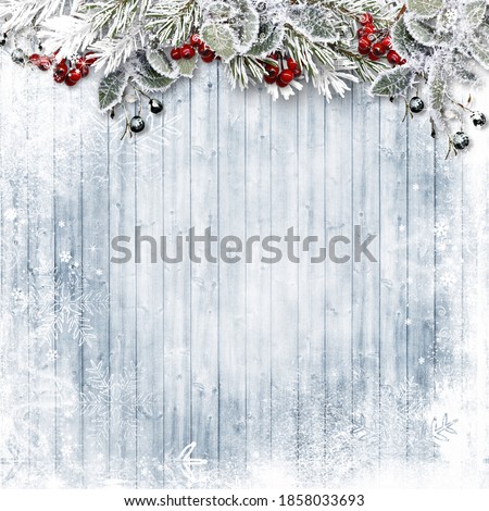 Christmas Holiday wood background with snow, holly and firtree. Copy space