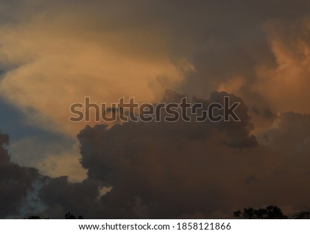 storm clouds in evening sun