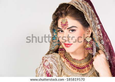 portrait of beautiful Indian bride, happy indian bride Royalty-Free Stock Photo #185819570