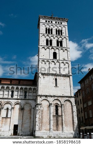Sideview of the belltower of the church of San Michele in Foro in Lucca, Italy. High quality photo