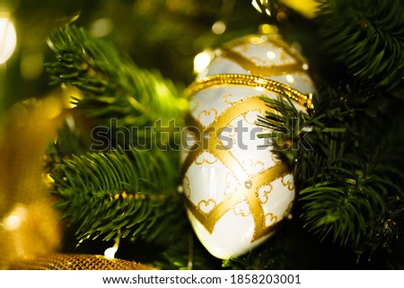 Christmas Balls Decorations with tree branches and ribbons